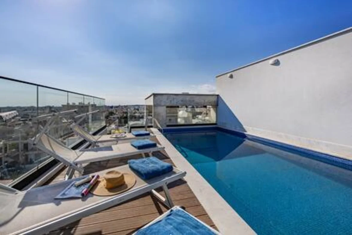 102 Piliou - City Views and Shared Rooftop Pool Access - living area in Limassol, Cyprus